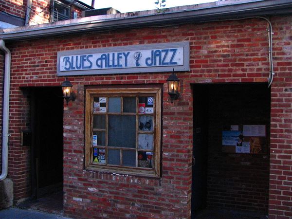 Blues Alley - Rudi Riet from Washington, DC, United States - Blues Alley Jazz The Front Entrance to Blues Alley. •	CC BY-SA 2.0 •	File:Blues Alley Front.jpg •	Created: 14 October 2006 Blues Alley Front - Blues Alley - Wikipedia  (10/14/2006 - Credits: Rudi Riet from Washington, DC, United States - Blues Alley Jazz)